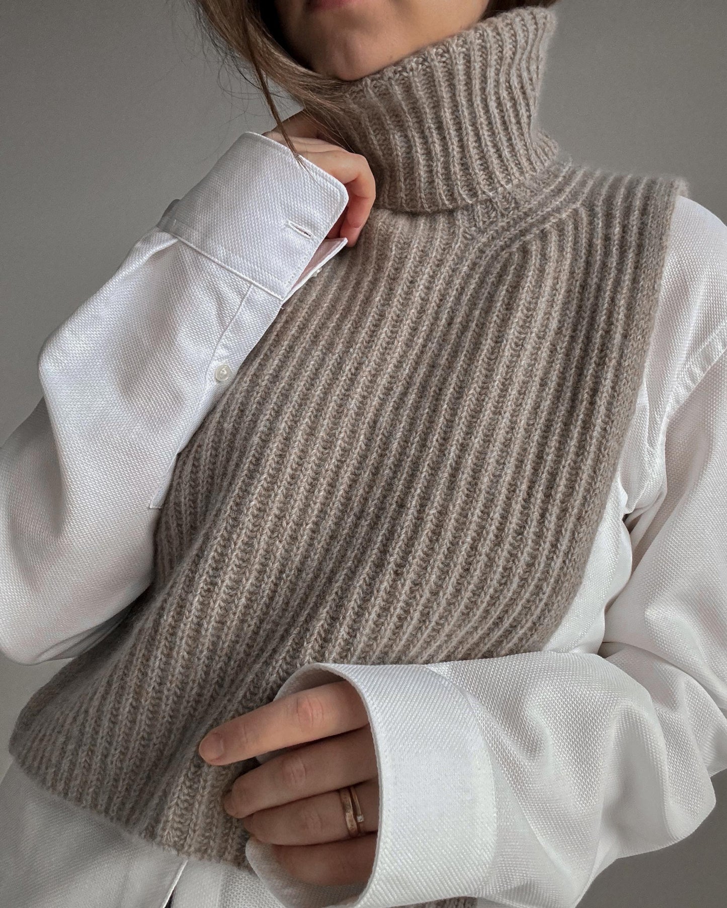 Crafty knitting blueprint of Bobbi Neck Warmer for stylish winter wear.