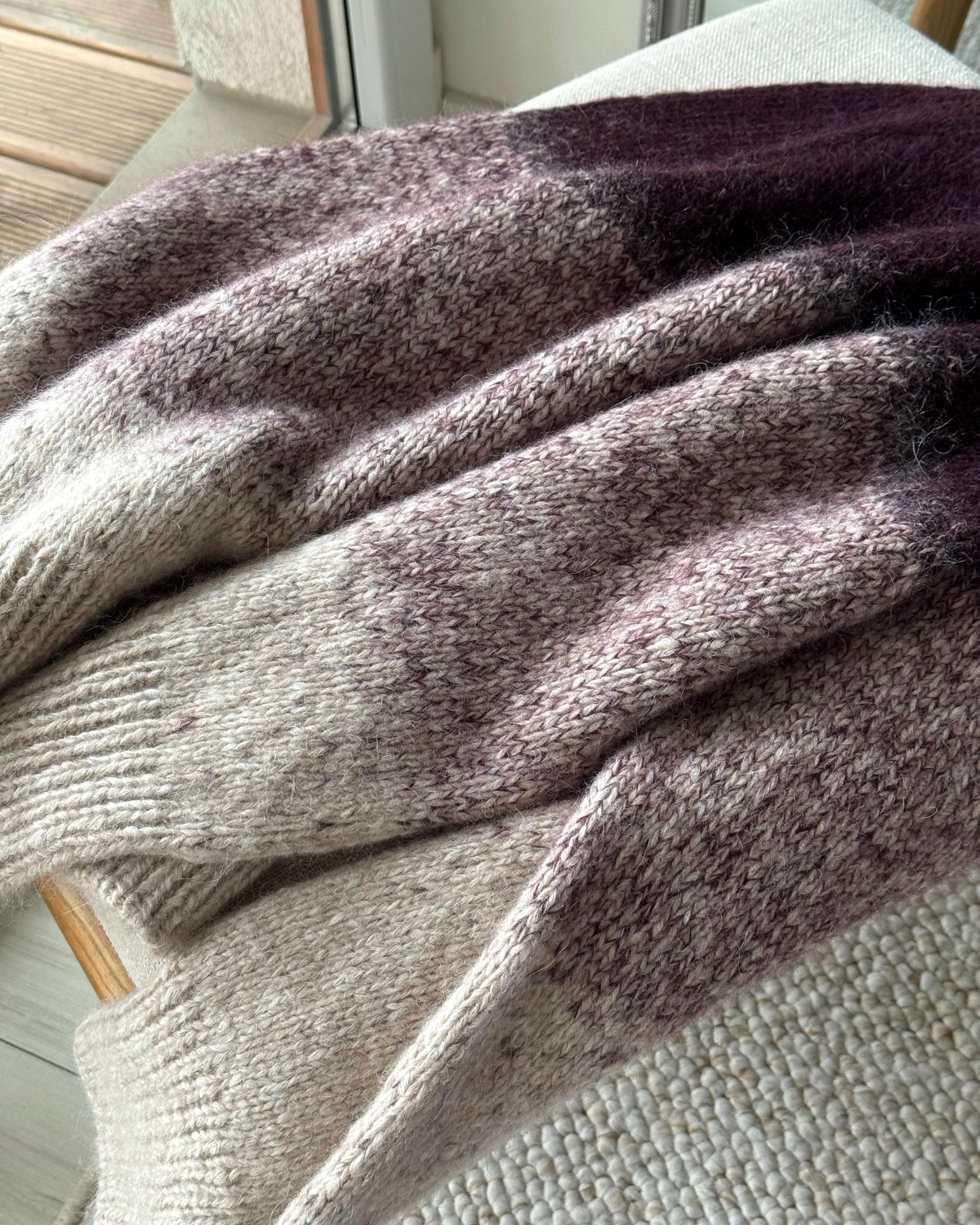 Advanced knitting pattern for relaxed fit women's pullover.