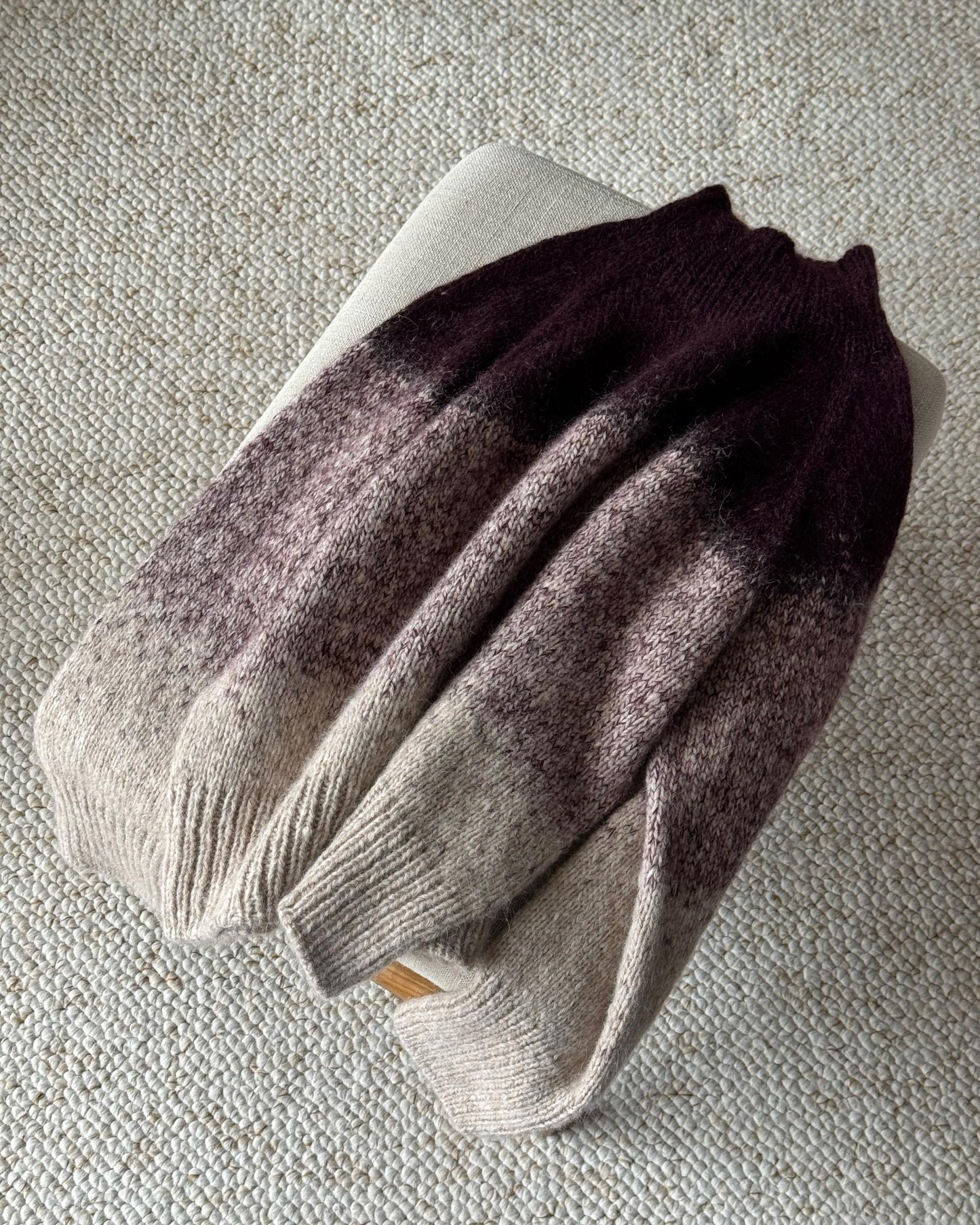 Refined sweater design with top down raglan construction.