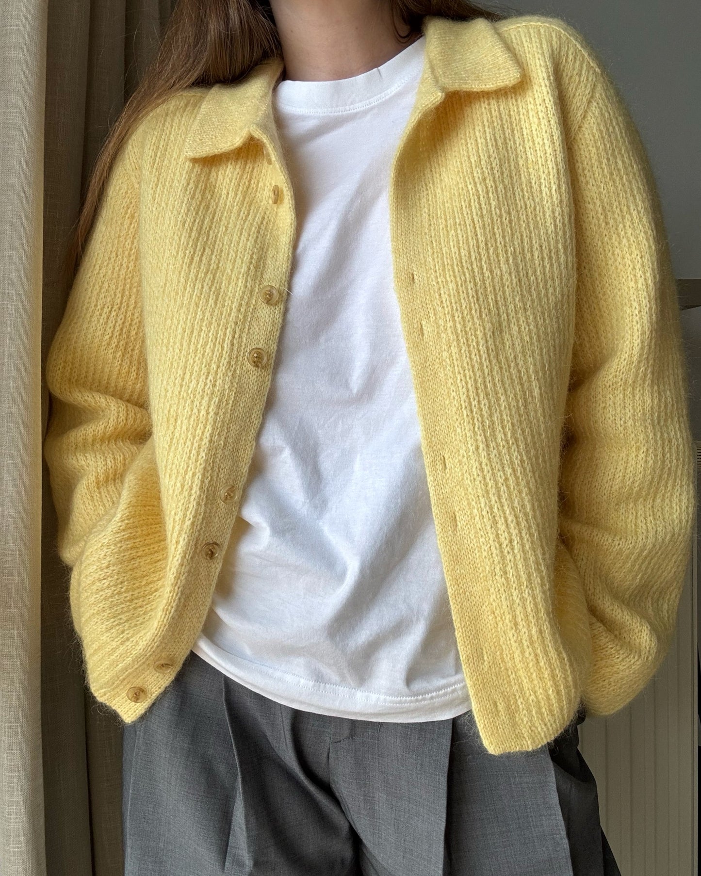 Expert level cardigan pattern image presenting knit blueprint for delicate yet structured button up garment.