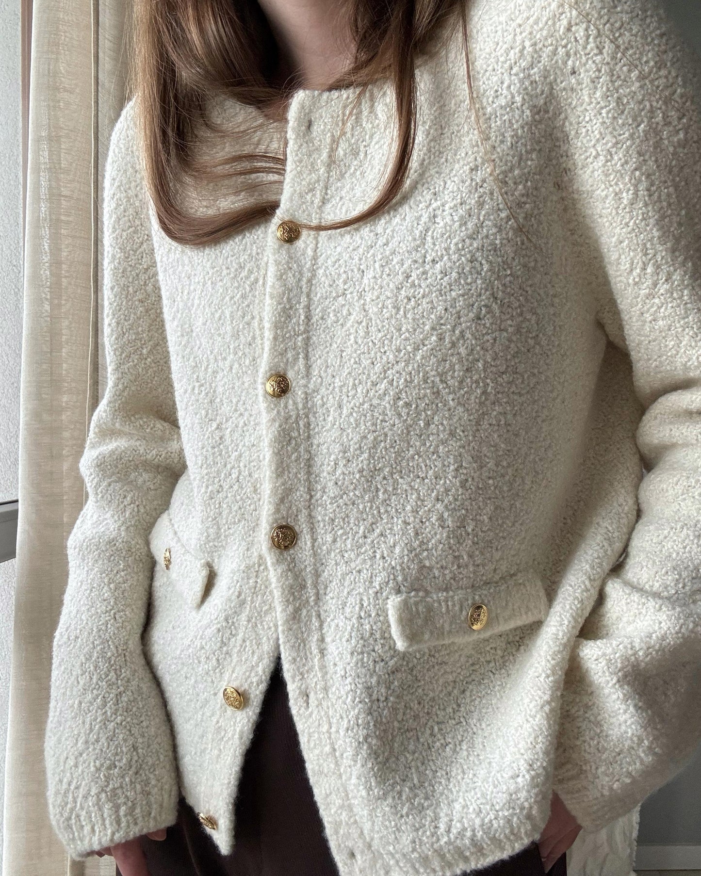 Knitted Manon Jacket open-front sweater in boucle yarn with regular fit.