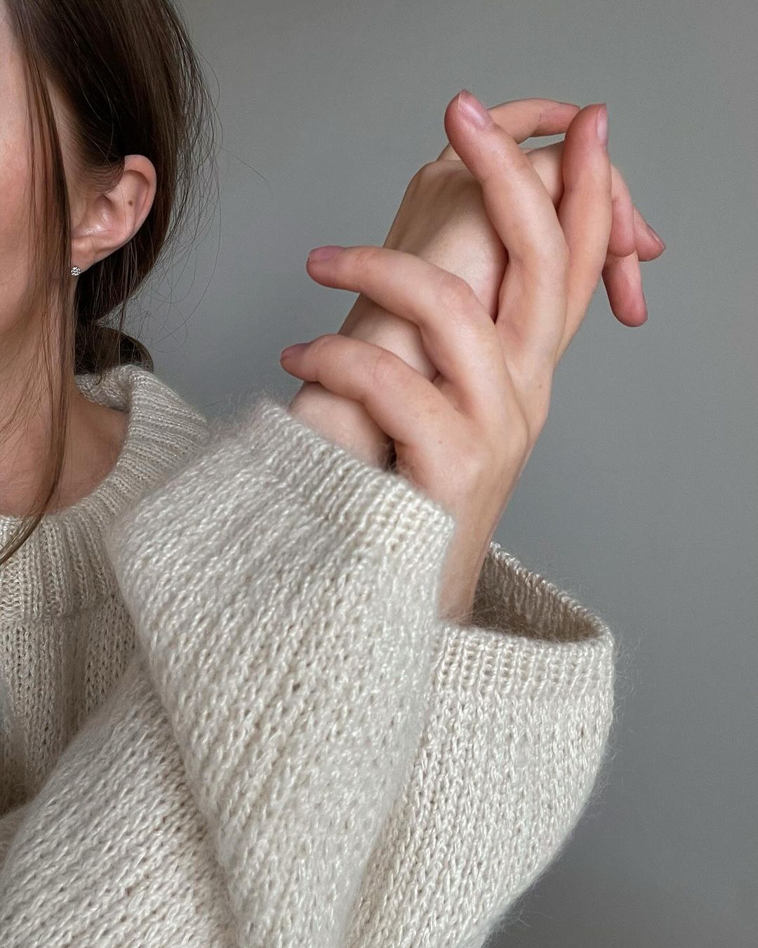 Chantal Sweater knitting pattern for girls, embodying contemporary style and sophistication, available in English