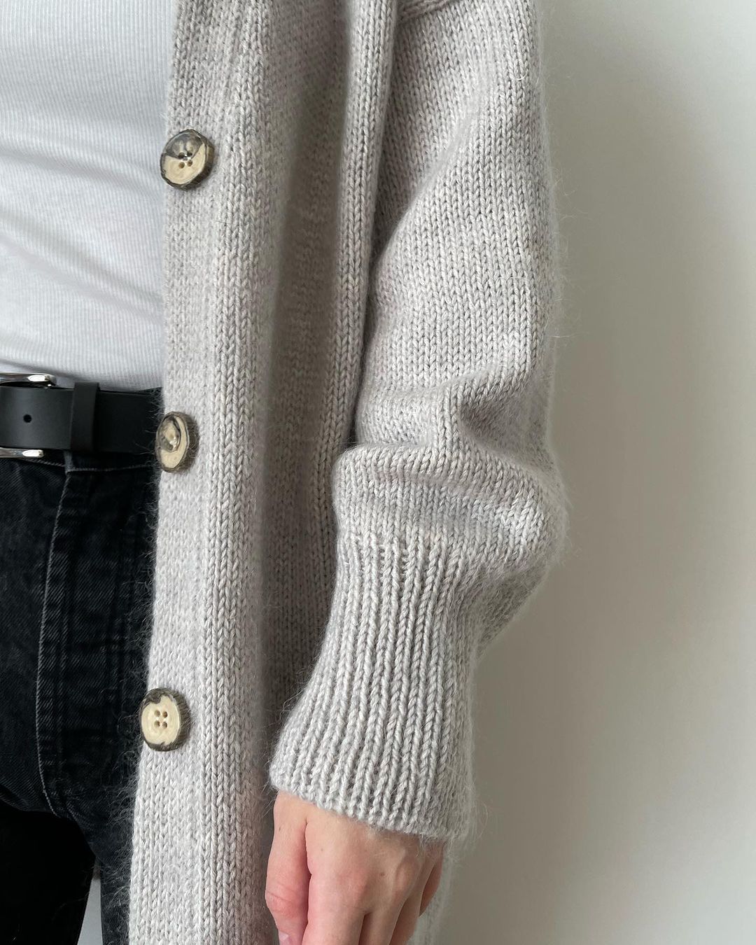 Buy Ralph Cardigan knitting pattern, featuring V-neckline and wide bottom and sleeve cuffs