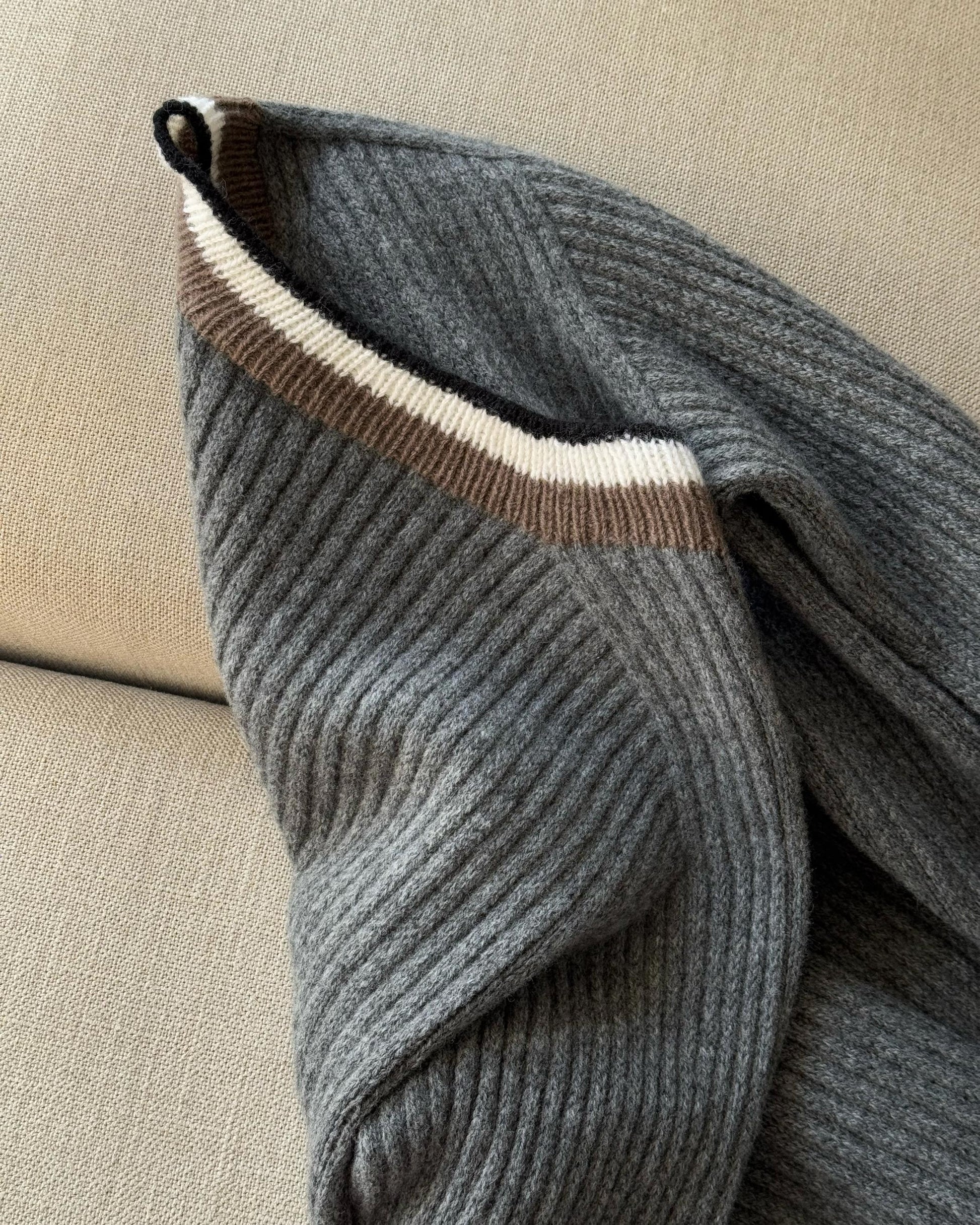 Advanced Carlotta Sweater pattern showcasing a soft, basic yet elegant V-neck.