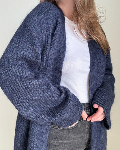 Knit guide for creating a kimono cardigan in elegant navy blue.