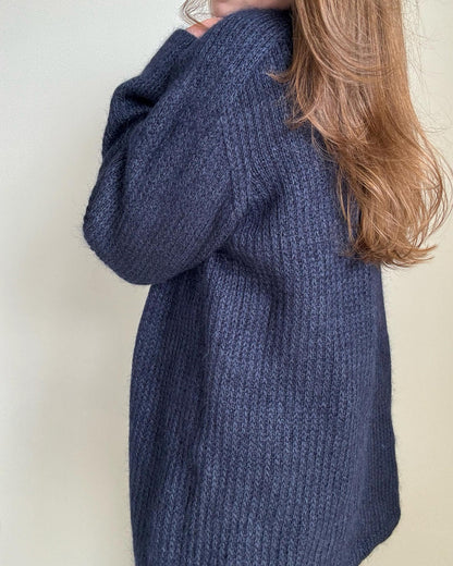 Modern knit scheme for a soft, oversized cardigan with belt.