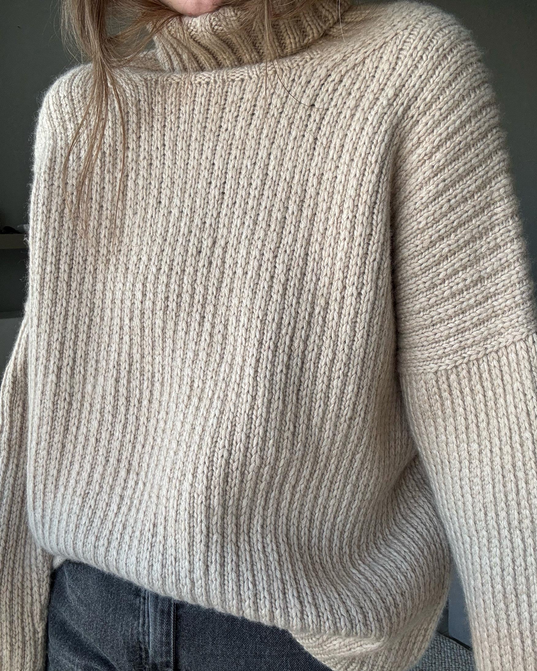 Oversized roll-neck sweater in alpaca wool with high neck design