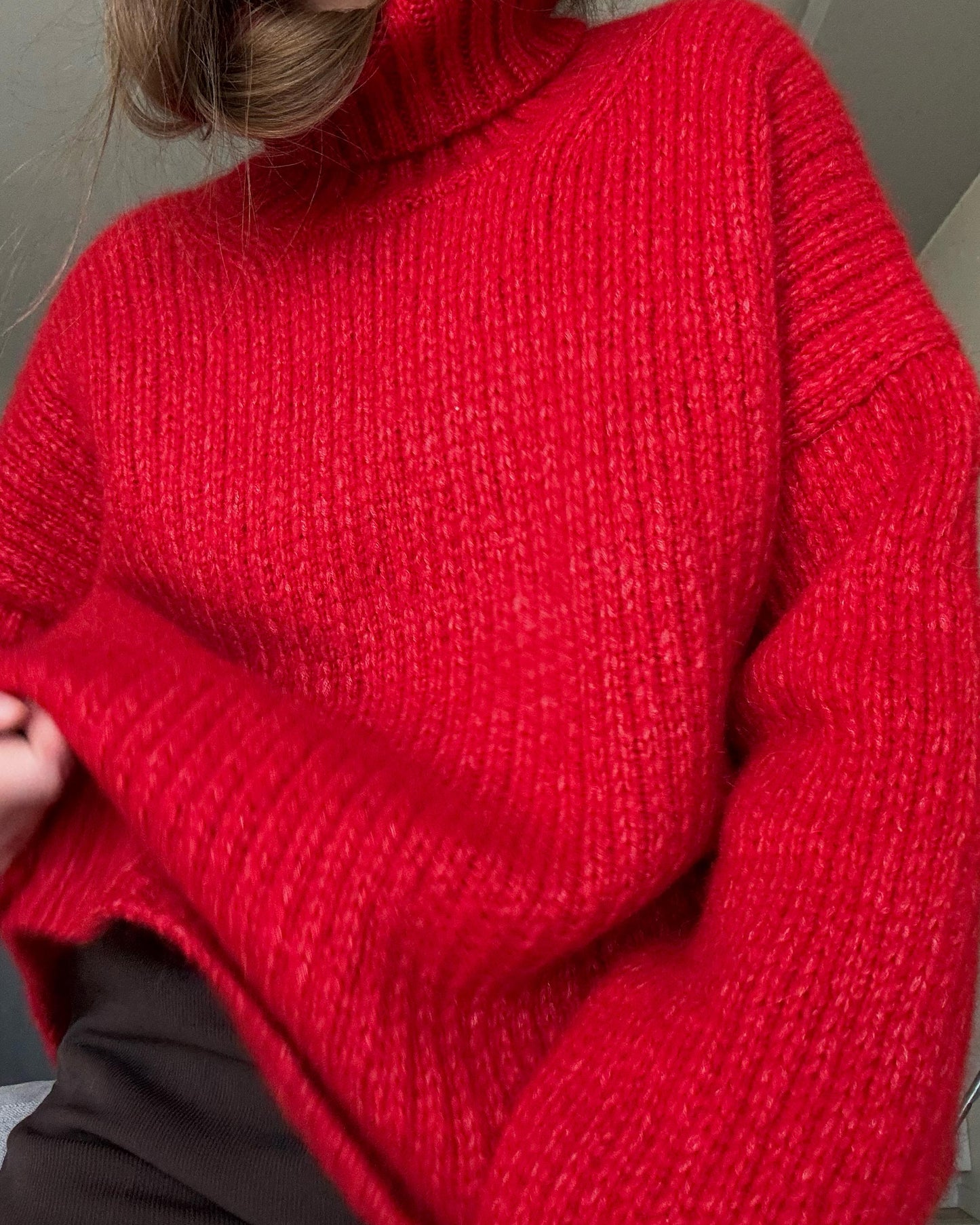 Soft and cozy alpaca wool sweater with oversized fit and top-down knitting style