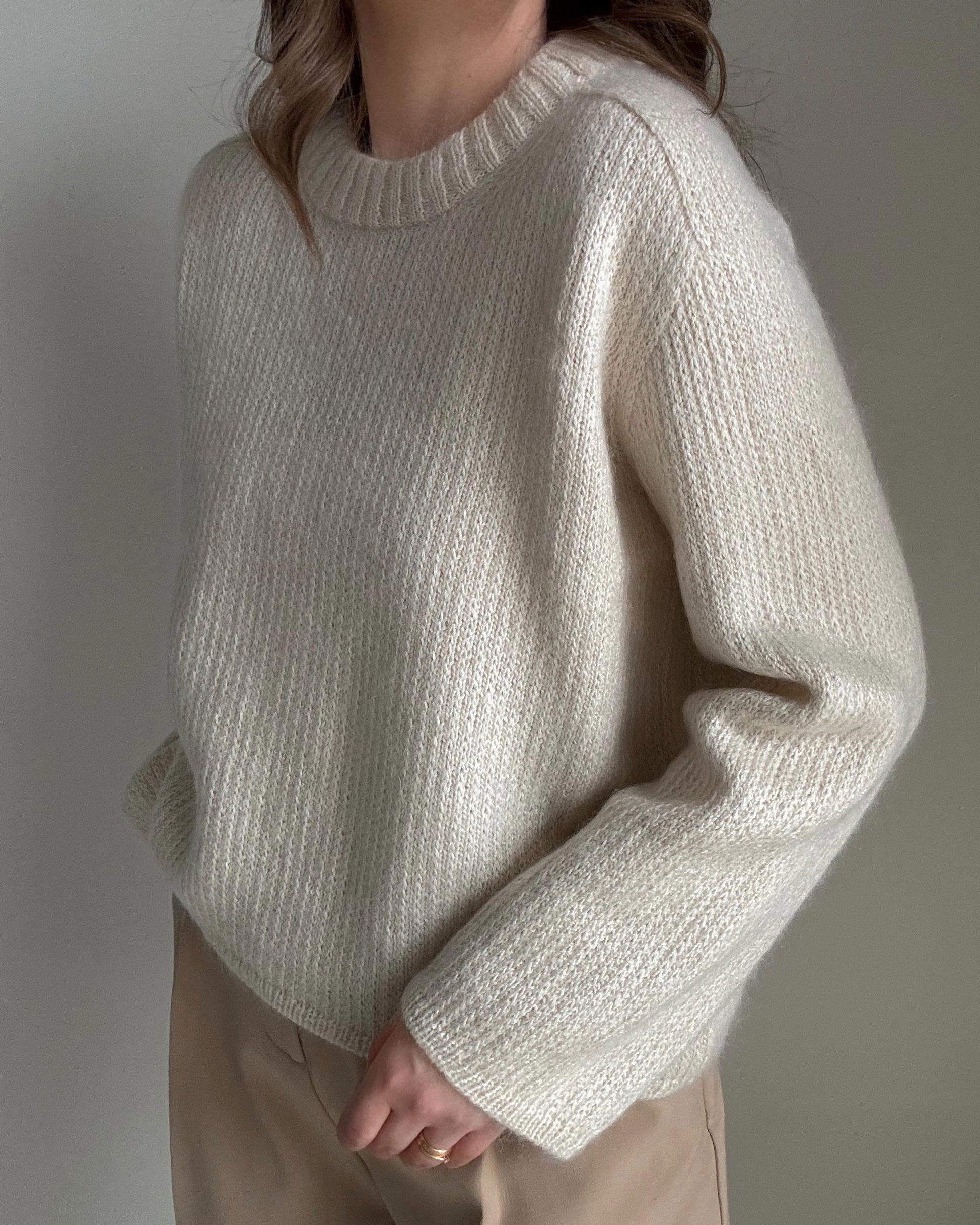 Contemporary and cute Chantal Sweater jumper pattern for ladies, with refined drop shoulders design.