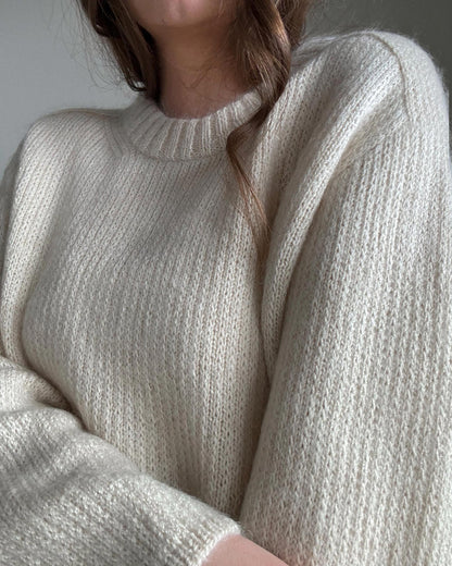 Chantal Sweater knitting pattern by morecaknit featuring a classic crewneck design in woolen silk mohair.