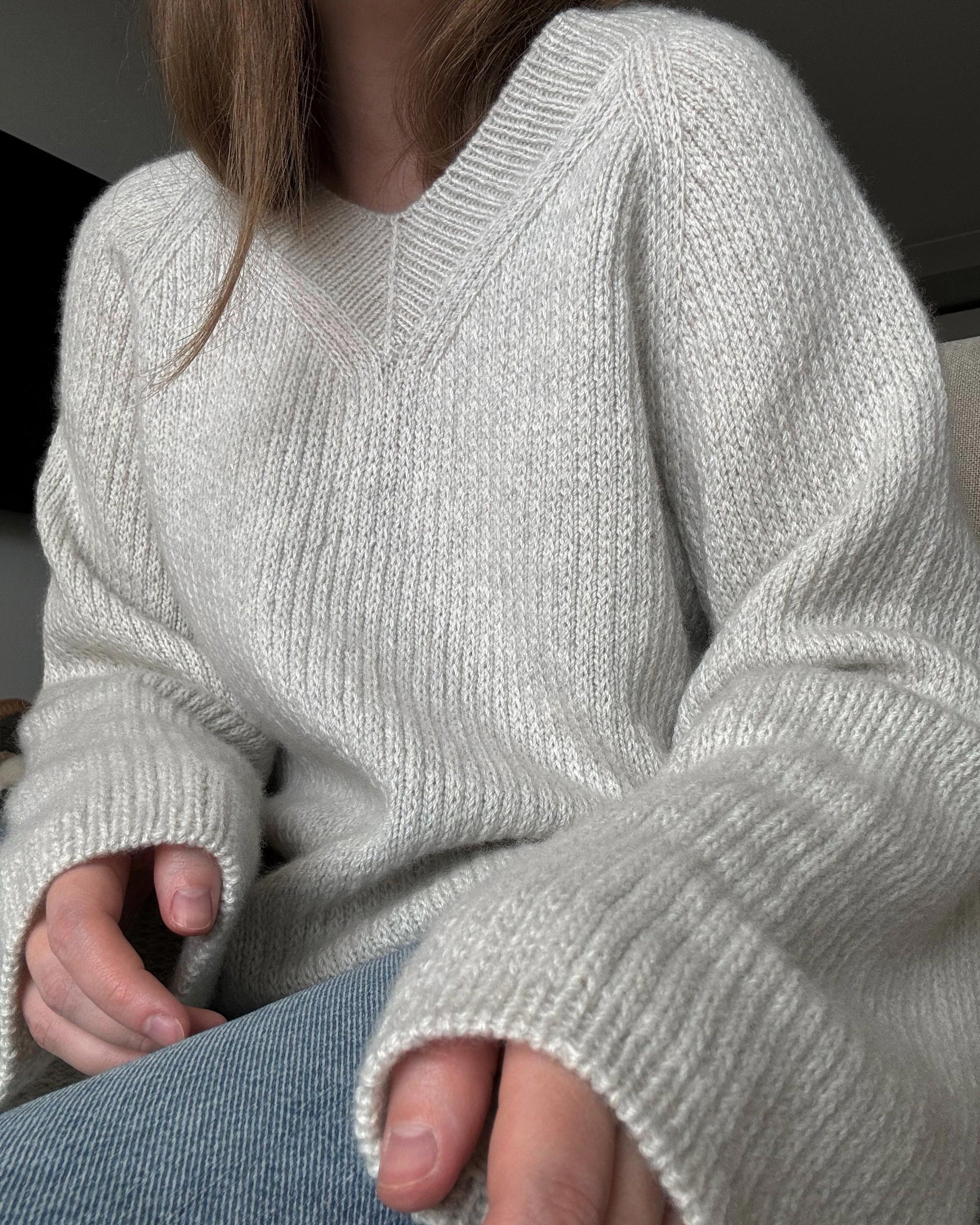 Knitted pullover with V-neck and relaxed fit, made using Moreca Knit Chantal Sweater pattern.