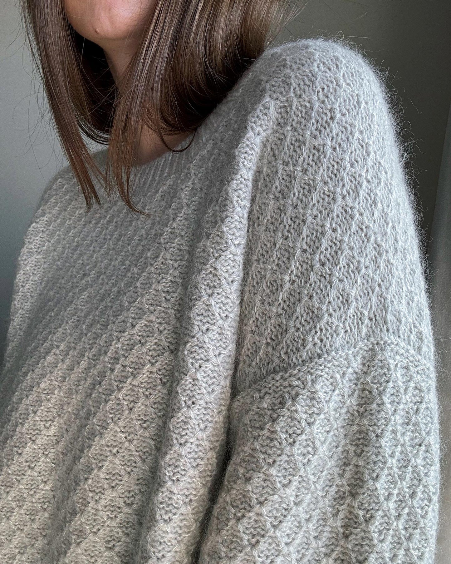 Feminine and soft Francesca Sweater knit pattern, perfect for advanced knitters.