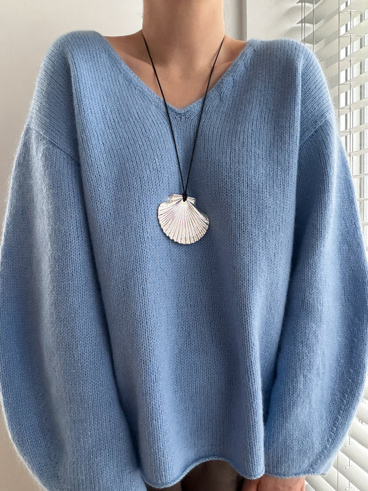 Three quarter view of Phoenix Sweater by Moreca Knit, aesthetic womens sweater in stockinette stitch