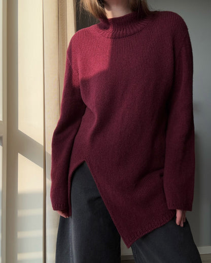 Side profile showing the minimalistic silhouette of this top-down knitting project by Moreca Knit.