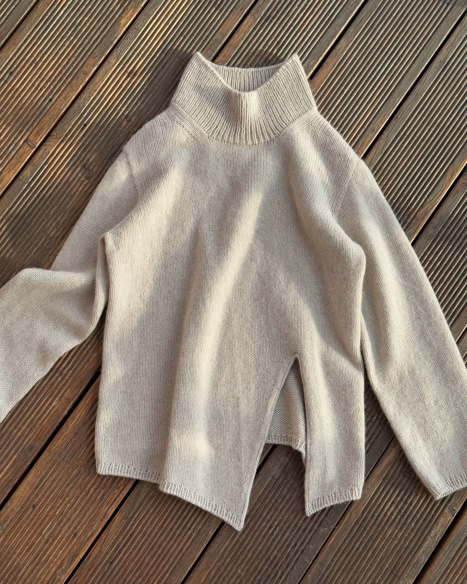 Focus on the refined stockinette stitch texture for a modern everyday pullover.