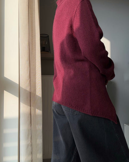 Back view of the mock neck construction made with soft merino or cashmere blend.