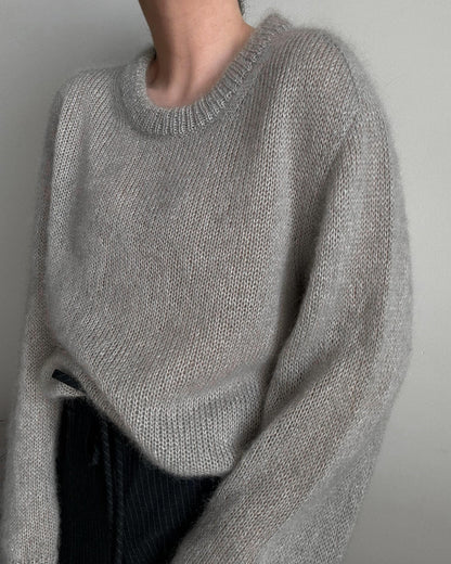 Micaela Sweater, a minimalist and elegant knitted pullover.