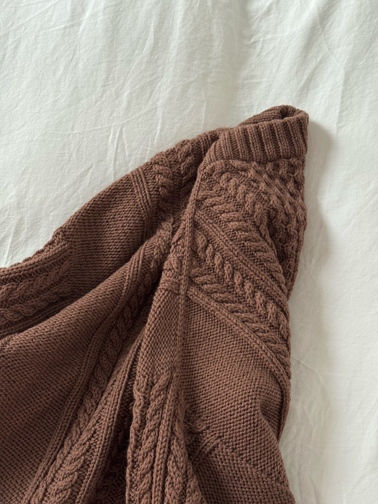 Warm wool cable sweater pattern designed with top down construction and drop shoulders