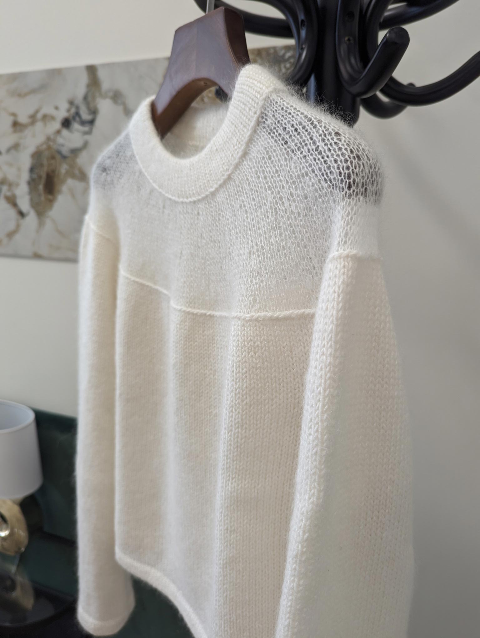 Knitted blouse with top down construction and crew neck