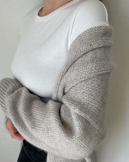Download Ralph Cardigan knitting pdf pattern featuring V-neck design and wide ribbing